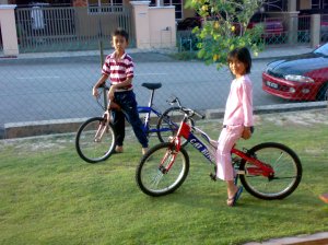 Mohd Syafiq And Nurul Ain with new bike
